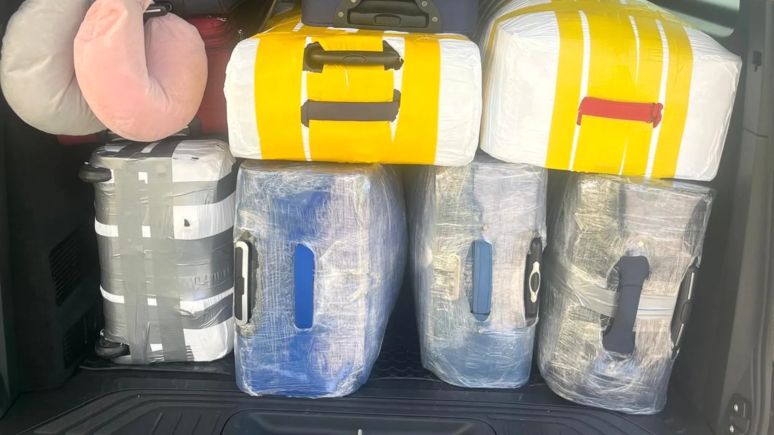 Milan airport transfer: suitcases loaded in the boot of the Mercedes minivan